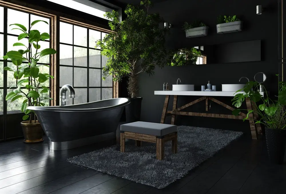 salle de bain avec carrelage noir